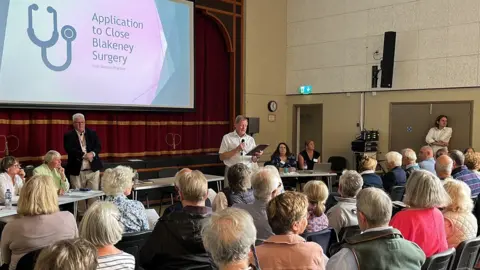 Shaun Whitmore/BBC Public meeting over proposed closure of Blakeney surgery