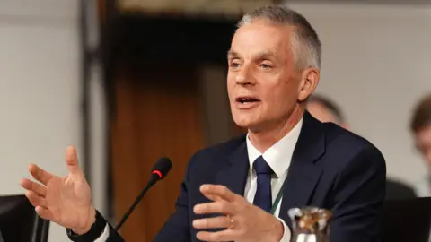 PA Media Tim Davie making a speech