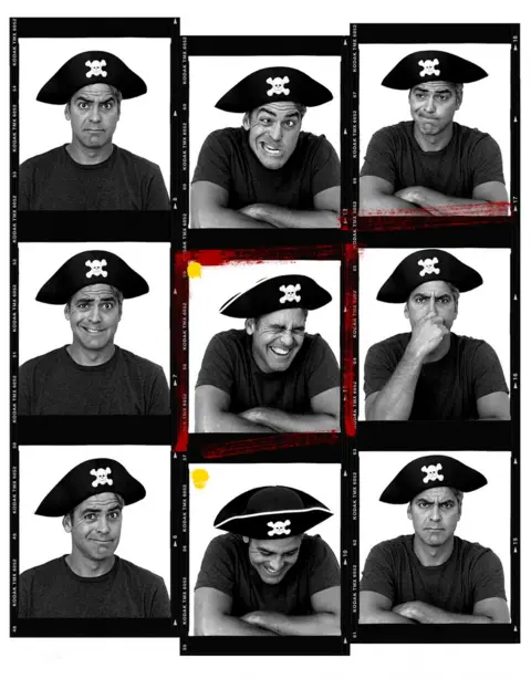 Andy Gotts George Clooney wears a pirate hat for portraits