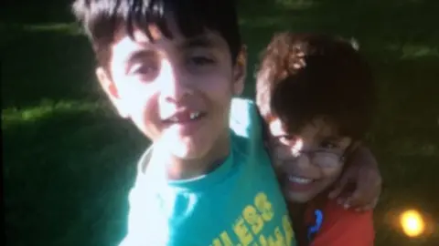 Family handout Asad Khan and his brother Saad