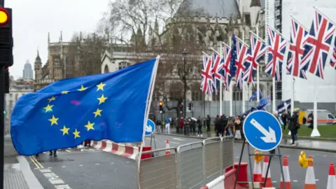 Getty Images EU and UK flags outside Parliament