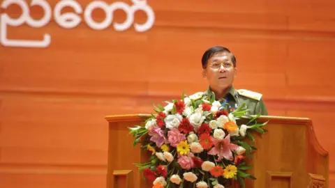 Getty Images Commander-in-chief Senior Gen Min Aung Hlaing speaks during the second session of the Union Peace Conference in Naypyidaw on May 24, 2017