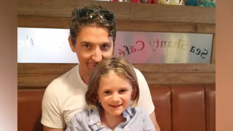 Contributed Alexander Davenport with his son