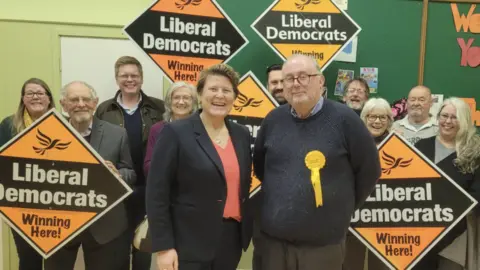 MP Sarah Dyke / Liberal Democrats MP Sarah Dyke, councillor Stephen Page and supporters