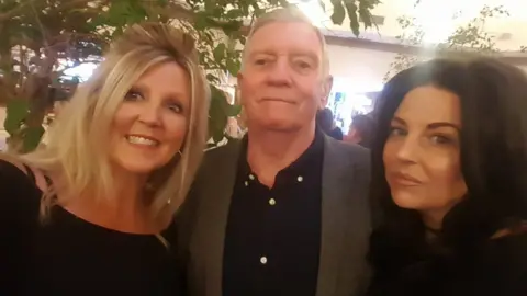 Sam Jacobs Sam Jacobs (left) with her sister Toni and father Terry