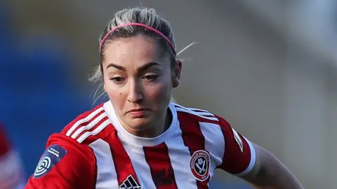 Getty Images Former Sheffield United player Maddy Cusack