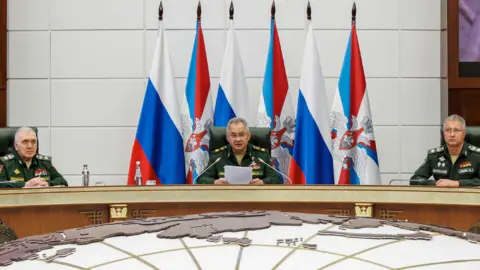 Russian Defence Ministry Press Service Defence Minister General Sergei Shoigu addressing a meeting in Moscow