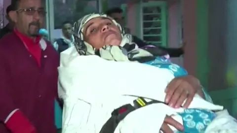 AFP An injured woman in Sidi Boulaalam