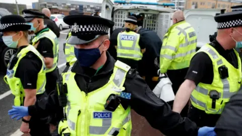 Reuters Police at demonstration in Cambridge