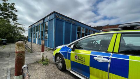 A police car parked outside Southchurch Library