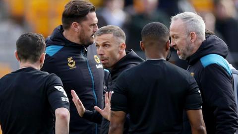 Gary O'Neil remonstrates with referee Tony Harrington after Wolves' defeat by West Ham