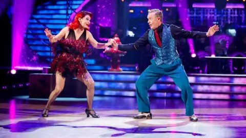 BBC/PA Dianne Buswell and Stefan Dennis during their appearance on the live show of Saturday's Strictly Come Dancing show