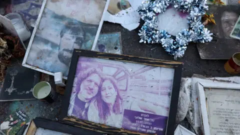 Reuters A weathered-out portrait of Shahar and Shlomi Matias, killed during the deadly October 7 2023 attack by Hamas