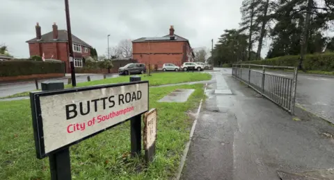 Video footage showing sign of Butts Road 
