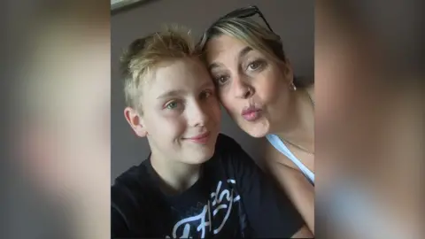 JAKE MORAN A selfie photo of Jake as a young teenager with his mum.