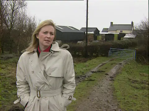 Penny outside the Tooze's farmhouse