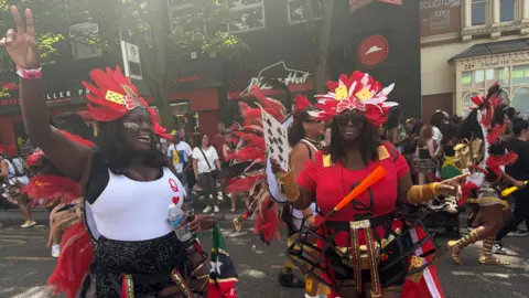 Two women celebrating the carnival