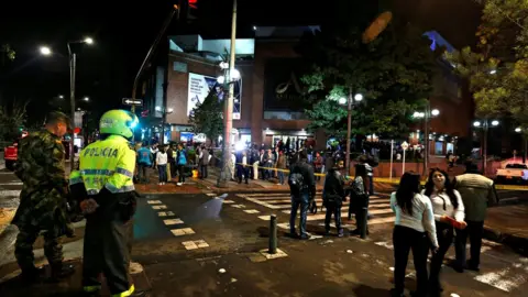 Reuters Police guarding the outside of the mall