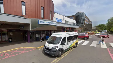 Google The exterior of the main entrance to the Royal Surrey County Hospital in Guildford.