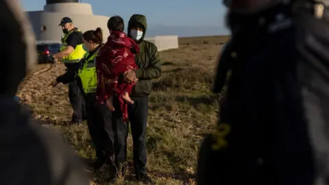 Getty Images Migrants arriving at Dungeness on 18 January