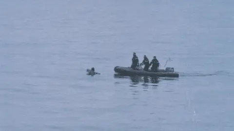 Prefecture Maritime de la manche The migrant in the water