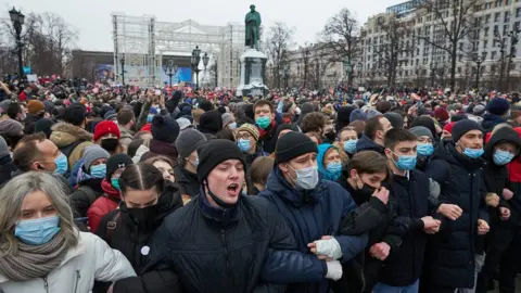 Getty Images People attend a rally in support of jailed opposition leader Alexei Navalny in Moscow