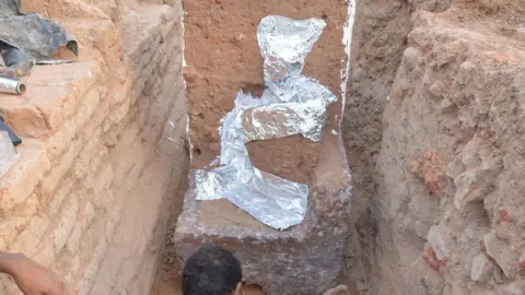 Bhakarba Thakor The picture shows the skeleton coated with silver material to protect it.