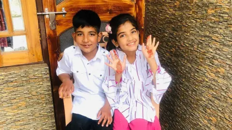 A photo of Zain and Urwa, 12-year-old twins killed by cross-border shelling