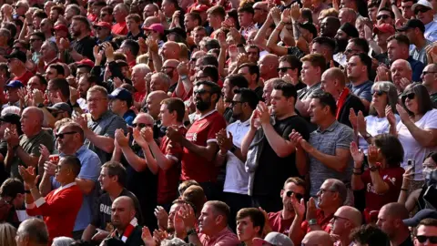 Getty Images Liverpool fans applaud