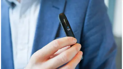 Getty Images Man with Blu e-cigarette