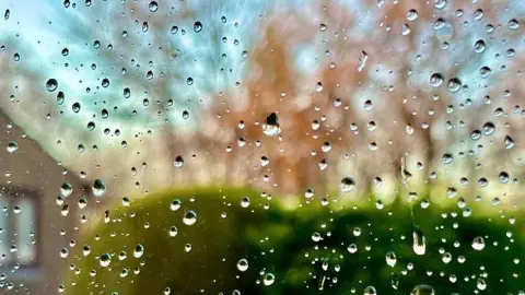 John G Raindrops on a window. 