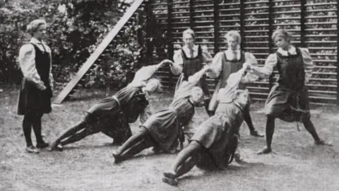 Martina Bergman Osterberg's students contesting a netball game outside at Dartford in 1897