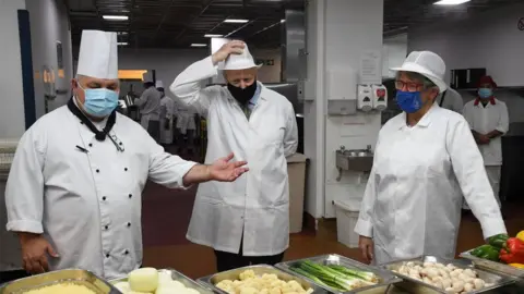 Reuters A chef at the Royal Berkshire Hospital, left, with Boris Johnson, centre, and Prue Leith, right