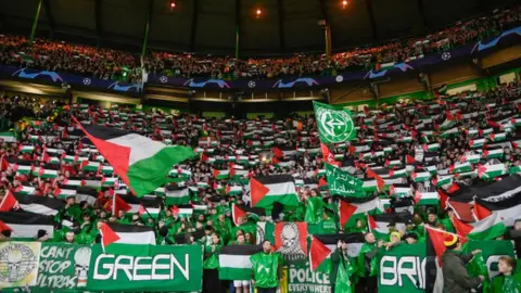 SNS Palestinian flags were flown by fans across the stadium on Wednesday night