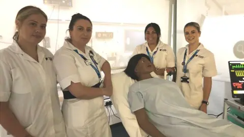 Vikki Irwin/BBC Student nurse, Rihanna Pond 27, Rachel Adam 39, Indie Tegano 30 and Niamh Wyard 20