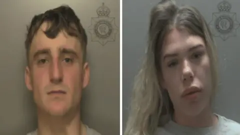 Humberside Police Two side-by-side police custody shots of Thomas Crombie (left) and Marley Hadfield. Crombie has short brown hair and is wearing a grey T-shirt. The wall behind him is grey. Marley Hadfield has long, blonde hair and is wearing a grey T-shirt. The wall behind her is grey.