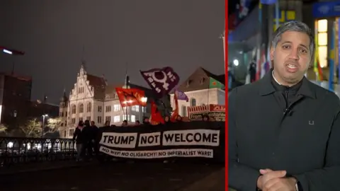 Spilt screen of a man in a black coat and protesters with a sign saying 'Trump not wlecome'