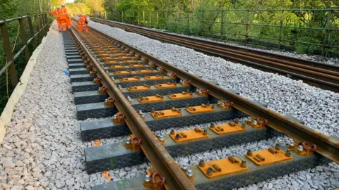 PA Media Railway sleepers being installed