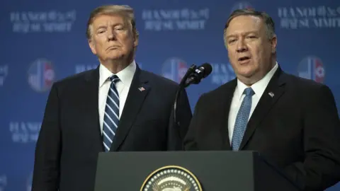 Getty Images US Secretary of State Mike Pompeo speaks at a news conference while President Donald Trump looks on