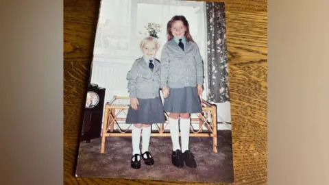 Lowri and her sister Rhiannon as children