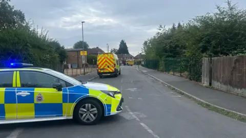 Police car, ambulance and fire engine at Grange Avenue in Normanton