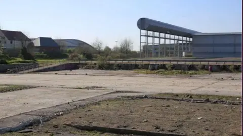BBC The cleared Motorola factory site and car park