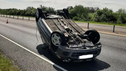 Car flipped onto it's roof