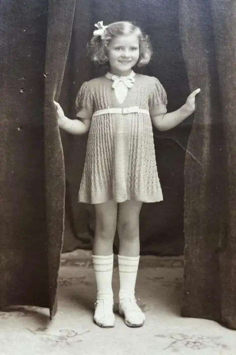Ann Mathers A black and white photo of Ann Mathers as a girl.