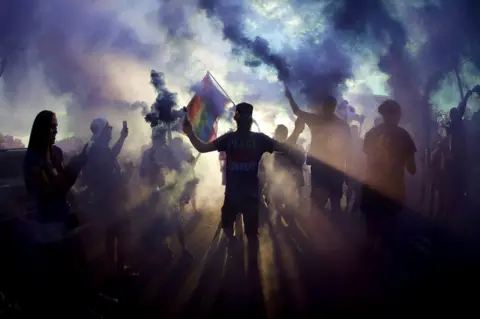 Kim Klement/ Reuters Orlando City Supporters march to the stadium prior to the game against the New England Revolution at Orlando City Stadium. 27 September 2017