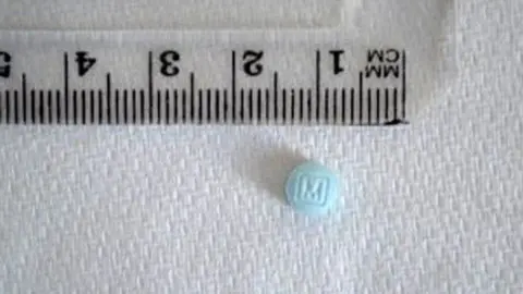 Wedinos small blue counterfeit oxycodone tablets