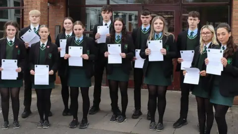 BBC Children in front of school