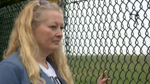 BBC Sarah Carter looking at theway at RAF Scampton