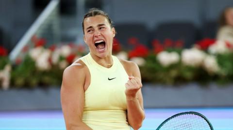 Aryna Sabalenka celebrates against Elena Rybakina