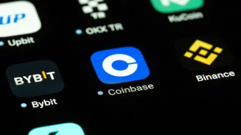 Coinbase app logo on a phone